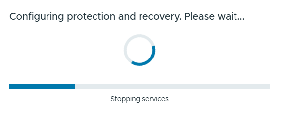 Configuring protection and recovery. Please wait&mldr; window with the progress bar at Stopping services